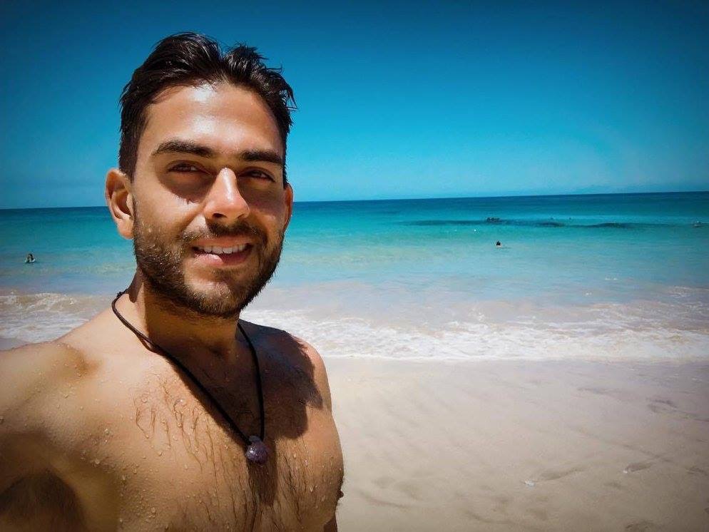 Sean Ali beach selfie during a travel and mindset season