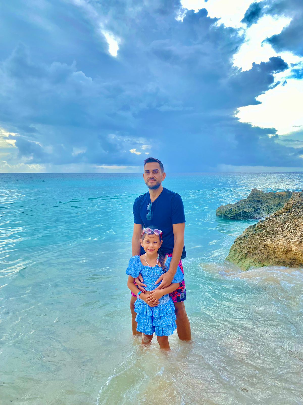 Sean Ali on a tropical beach during a manifestation and freedom season